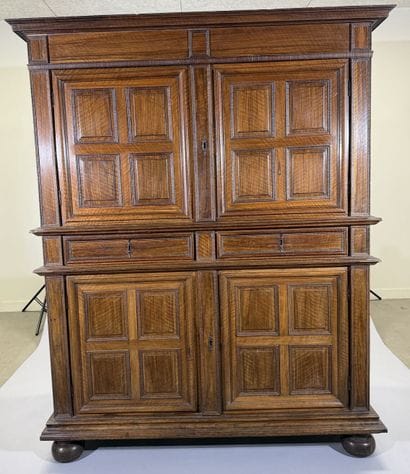 Two-section walnut cabinet with four-panel...