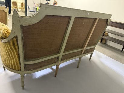 A set of six armchairs and one sofa, made...