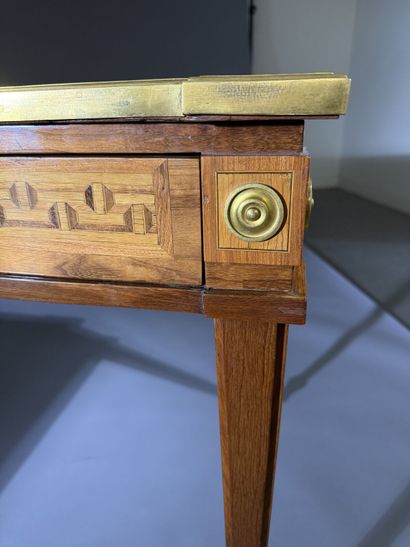 A flat-topped desk made of rosewood and amaranth;...