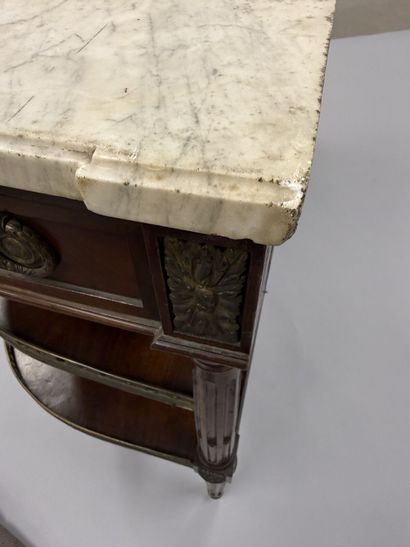 A pair of half-moon-shaped mahogany console...
