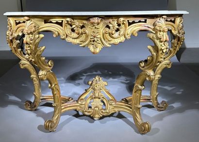 Carved and gilded wooden console table, resting...
