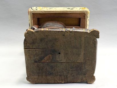 Rectangular, stained wooden stool with a...