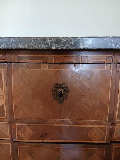 Center-recessed veneered wood chest of drawers...