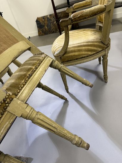 A set of six armchairs and one sofa, made...