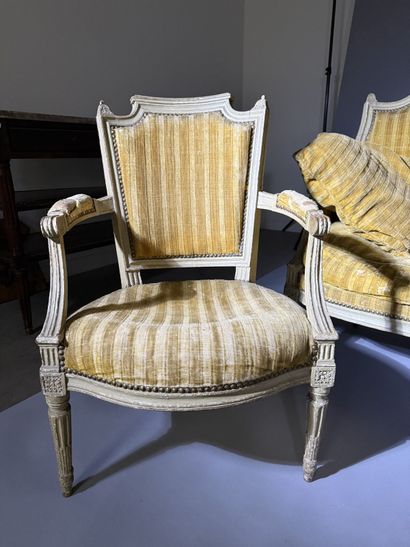 A set of six armchairs and one sofa, made...