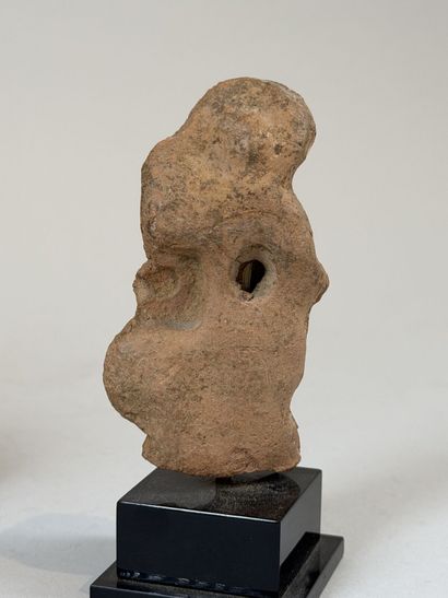 Set of three heads, including one grotesque...