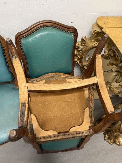 Four chairs in molded and carved beech, with...