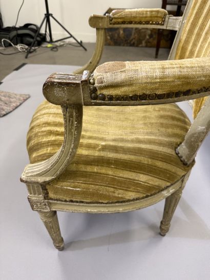 A set of six armchairs and one sofa, made...