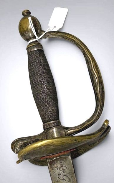 Épée de garde du corps du Roi. 
Fusée entièrement...