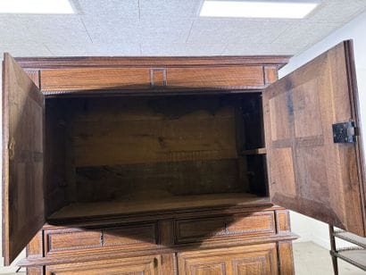 Two-section walnut cabinet with four-panel...