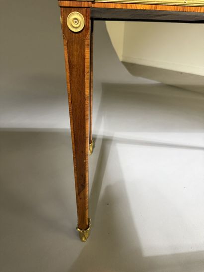 A small, flat desk made of rosewood and amaranth,...