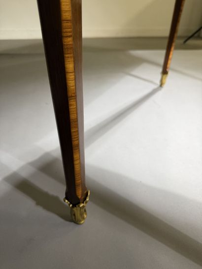 A small, flat desk made of rosewood and amaranth,...