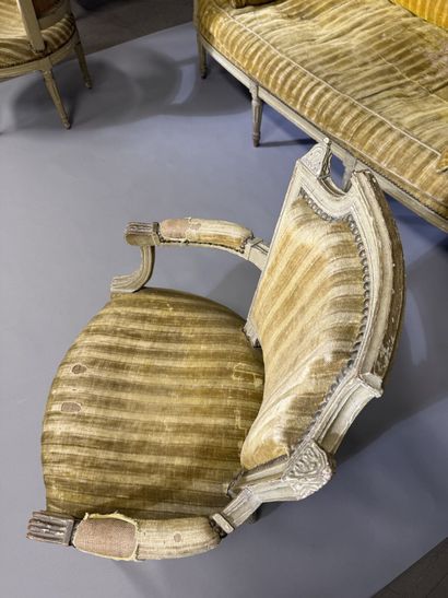 A set of six armchairs and one sofa, made...