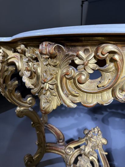 Carved and gilded wooden console table, resting...
