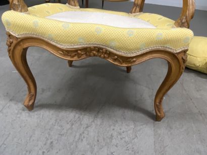 A set of four cabriolet armchairs in natural...