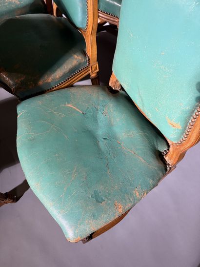 Ten chairs in molded beech with rounded backs,...