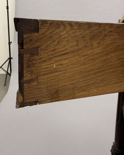 A pair of half-moon-shaped mahogany console...