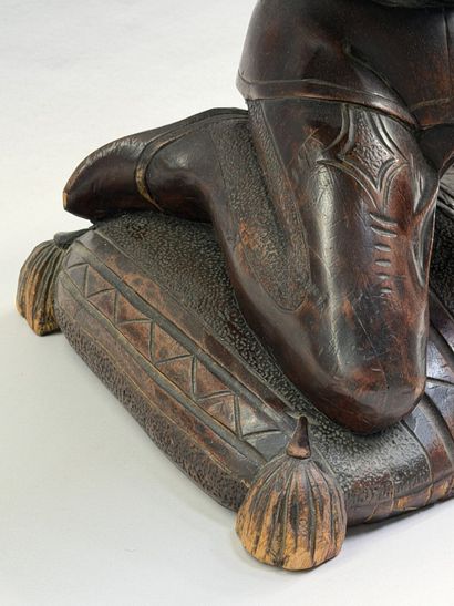 Rectangular, stained wooden stool with a...