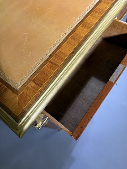 A small, flat desk made of rosewood and amaranth,...
