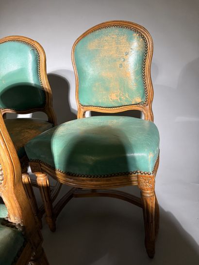 Ten chairs in molded beech with rounded backs,...