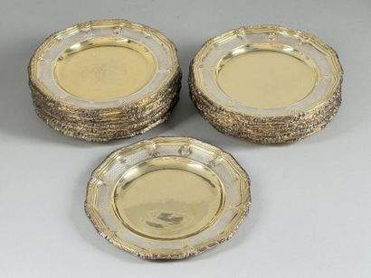 Set of twenty-four multi-lobed vermeil plates...