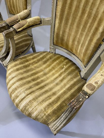 A set of six armchairs and one sofa, made...