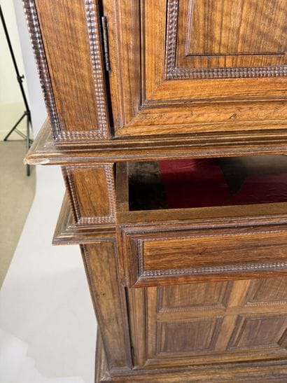 Two-section walnut cabinet with four-panel...