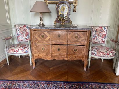 Center-recessed veneered wood chest of drawers...