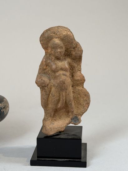 Set of three heads, including one grotesque...