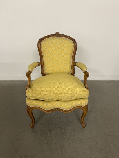 A set of four cabriolet armchairs in natural...