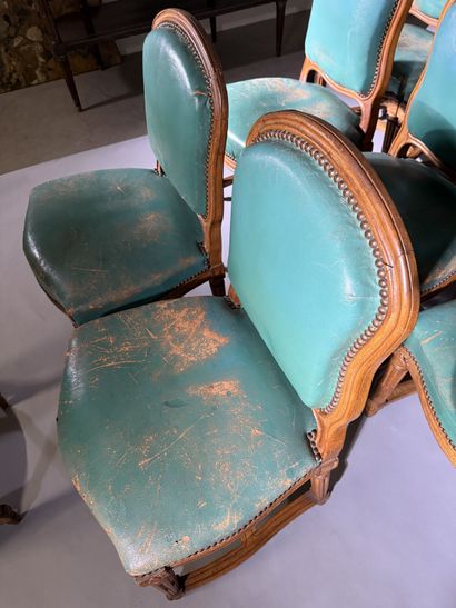 Ten chairs in molded beech with rounded backs,...