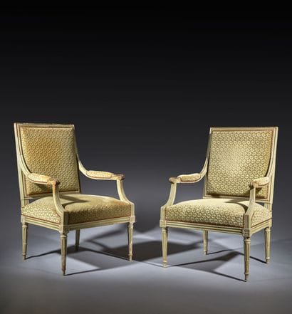 Pair of molded and painted beechwood armchairs...