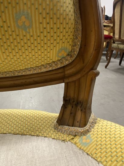 A set of four cabriolet armchairs in natural...