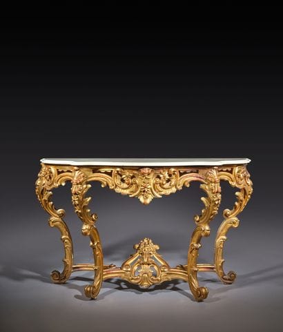 Carved and gilded wooden console table, resting...