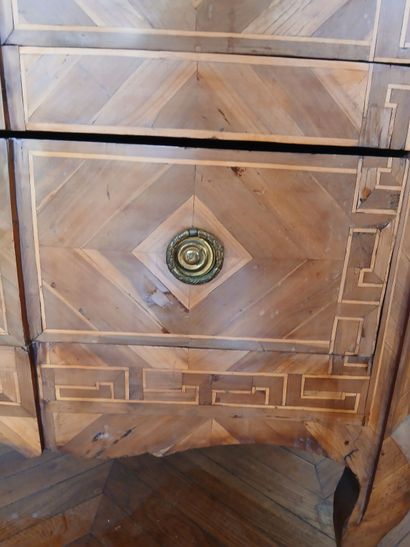 Center-recessed veneered wood chest of drawers...
