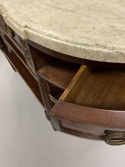 A pair of half-moon-shaped mahogany console...