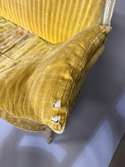 A set of six armchairs and one sofa, made...