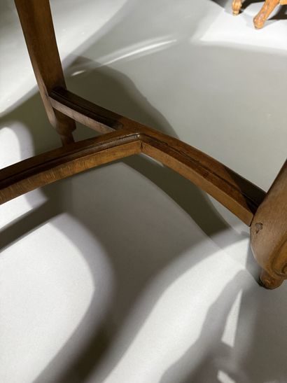 Four chairs in molded and carved beech, with...