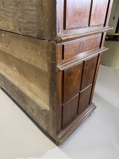 Two-section walnut cabinet with four-panel...