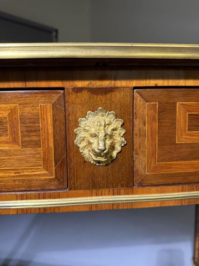 A small, flat desk made of rosewood and amaranth,...