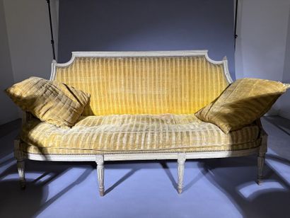 A set of six armchairs and one sofa, made...