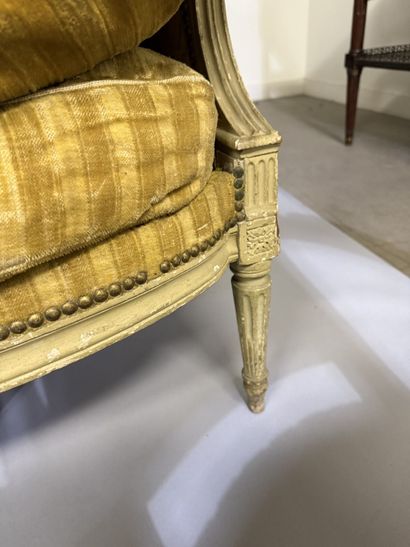 A set of six armchairs and one sofa, made...