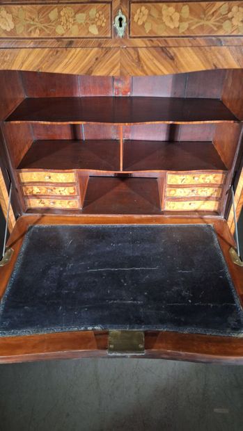Wood veneer secretary desk opening via a...