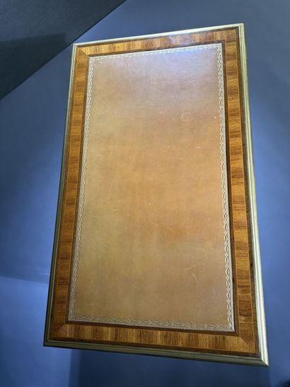 A small, flat desk made of rosewood and amaranth,...