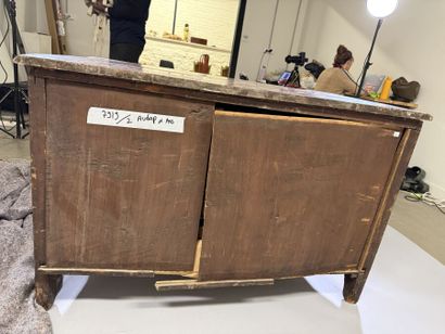 A rosewood chest of drawers with a curvilinear...