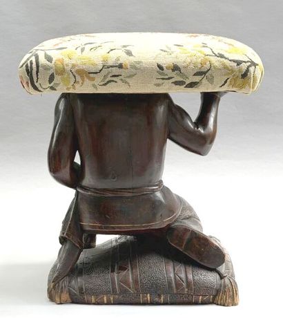 Rectangular, stained wooden stool with a...