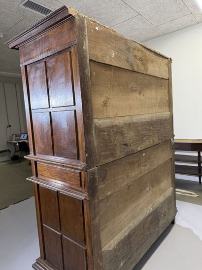 Two-section walnut cabinet with four-panel...