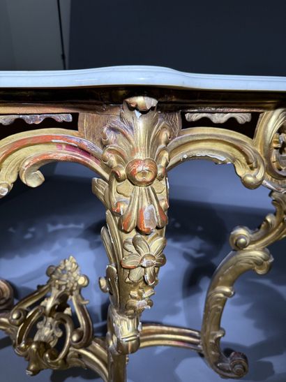 Carved and gilded wooden console table, resting...