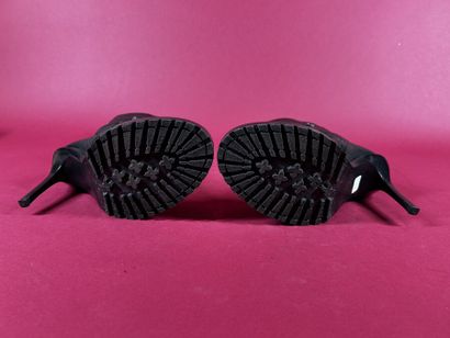 ANN DEMEULEMEESTER
Bottes en cuir noir, bout...