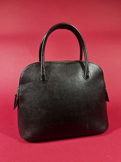 CÉLINE
Sac en cuir grainé noir, fermeture...